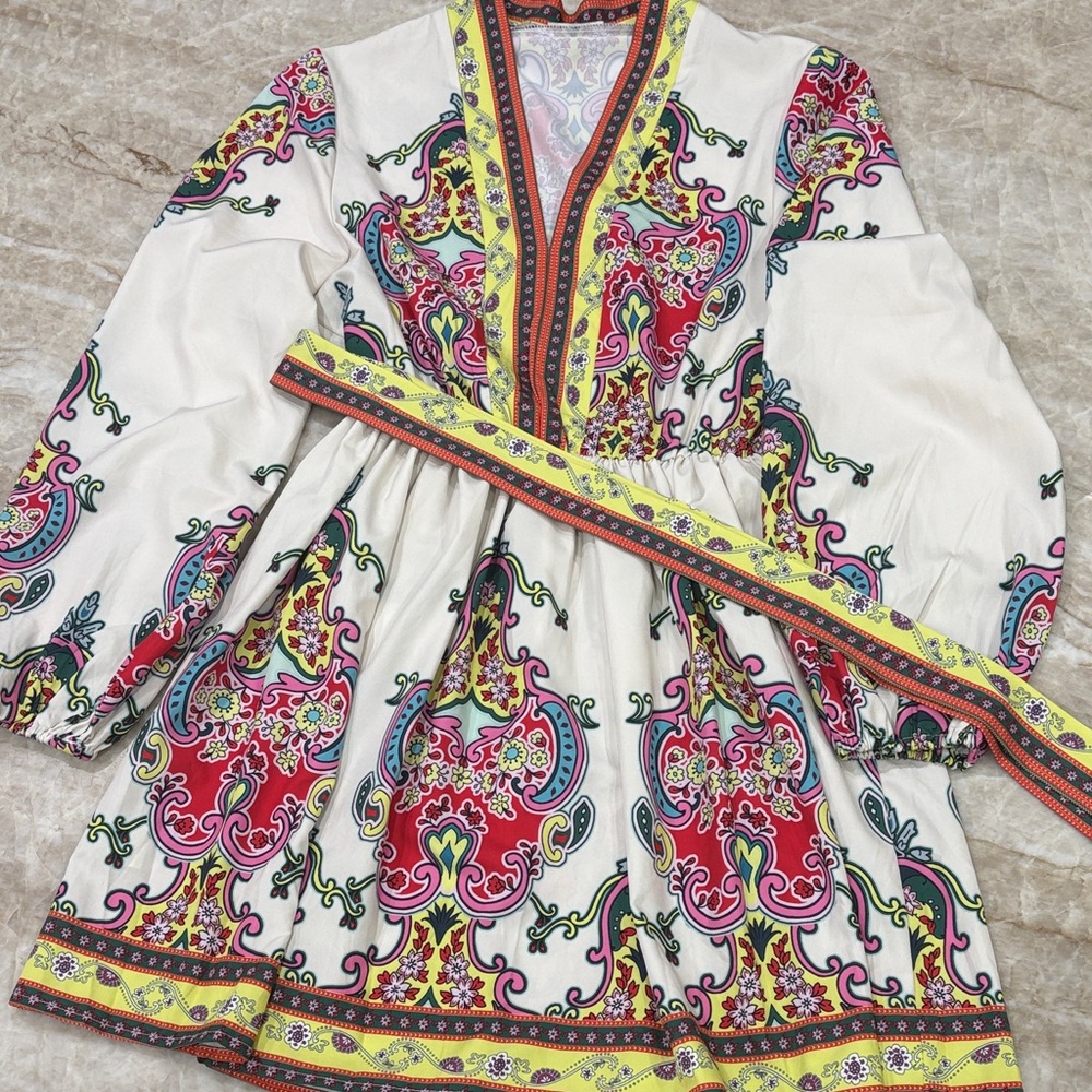 Ladies (Medium) V-Neck Dress with vibrant colors in excellent used condition.